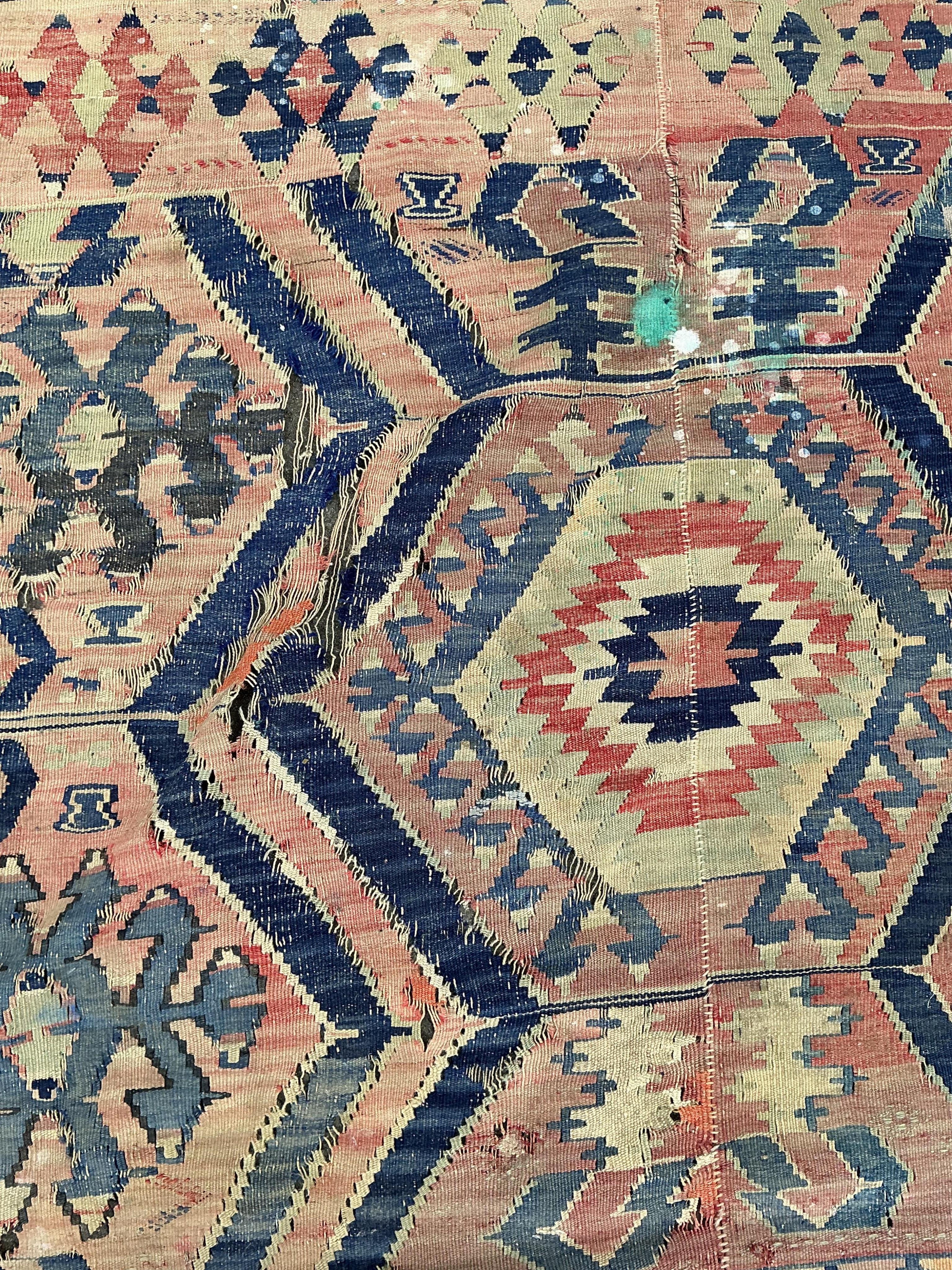 A Kilim polychrome flatweave carpet, 298 x 199cm